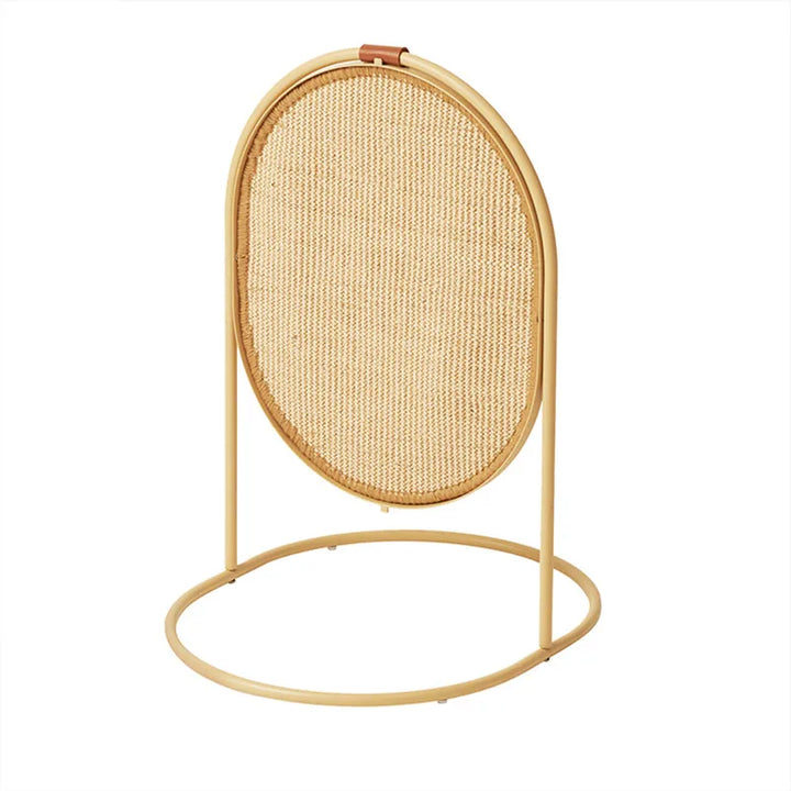 Designer cat accessory: a scratching post with sisal texture and a dangling toy, blending with modern home decor