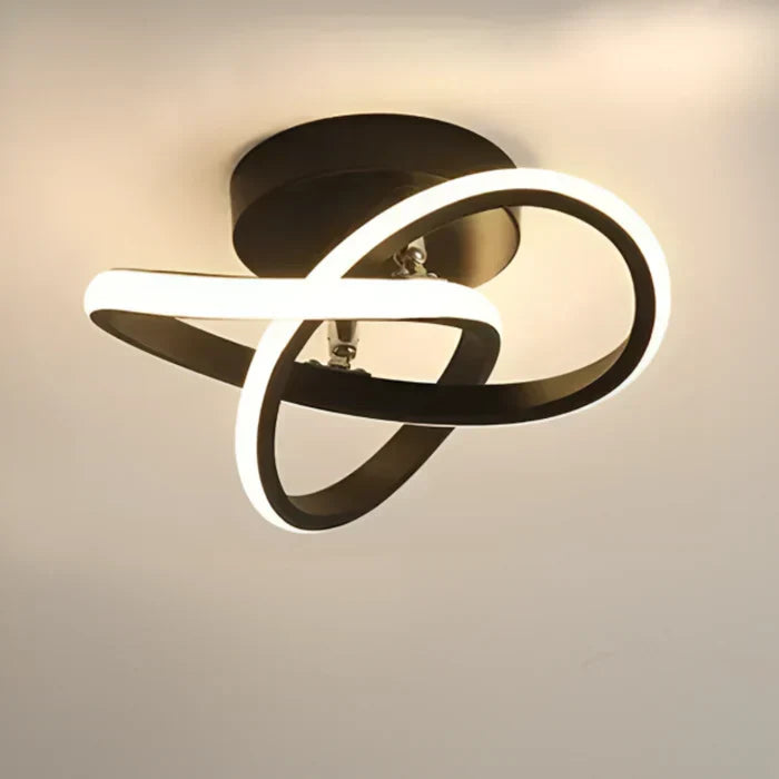 Unique dual ring LED ceiling fixture. Modern, energy-efficient lighting for contemporary homes & offices.