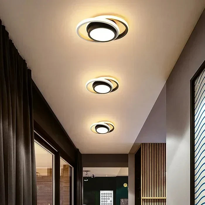 Stylish white modern LED ceiling lamp, dual ring design. Bright, energy-efficient light for hallways & offices.
