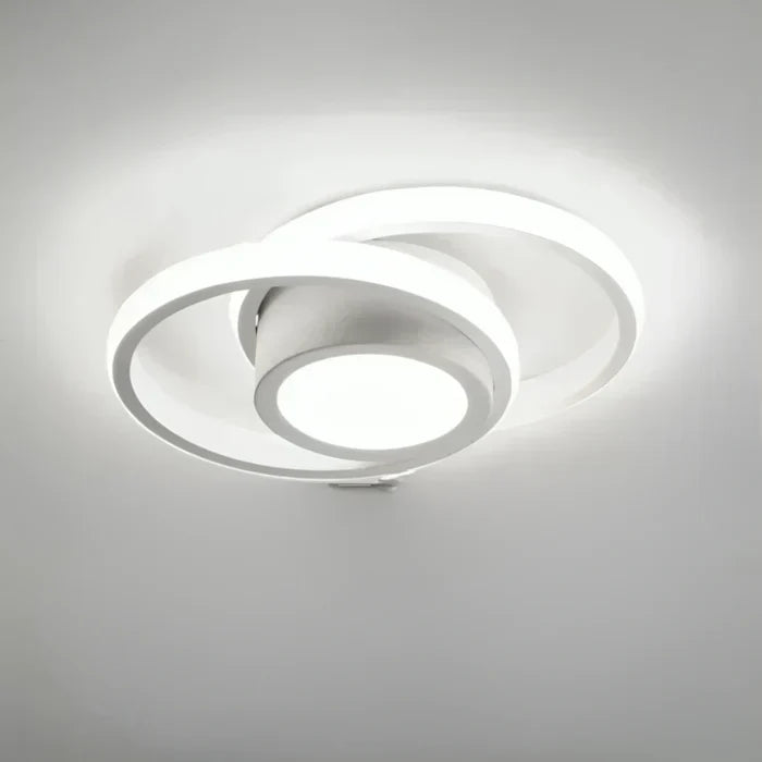 Energy-efficient LED ceiling lamp with dual rings. Modern design for bright, decorative home & office lighting.