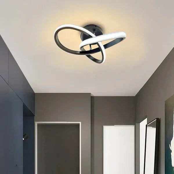 Modern LED ceiling lamp with elegant dual rings. Perfect contemporary lighting for living rooms & homes.
