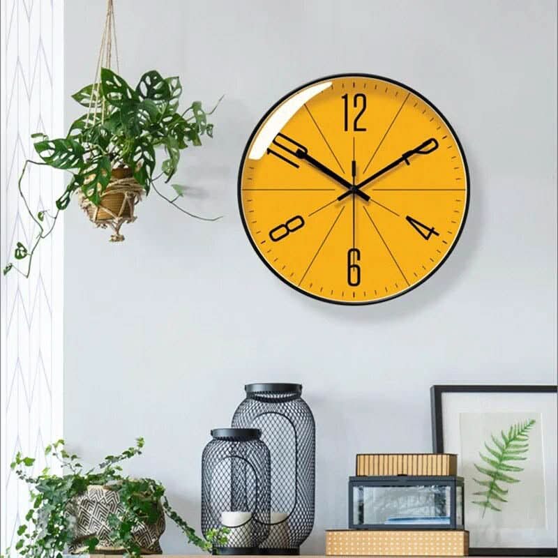 Nordic modern wall clock for living room, featuring a sleek design & silent operation. A stylish home decor item.