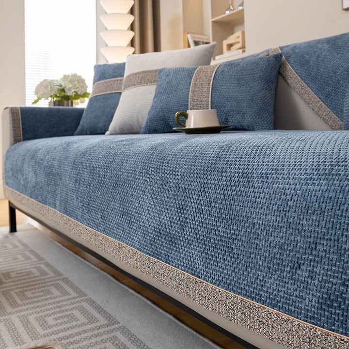 Full view of a living room with a modern tweed chenille sofa cover, pet and kid-friendly