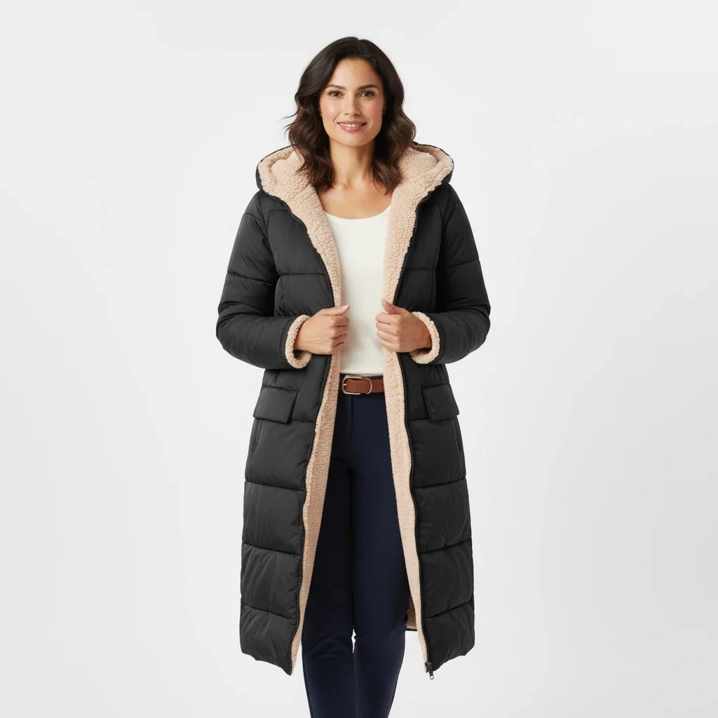 Fashionable women's padded jacket, hooded and warm for cold winter days.