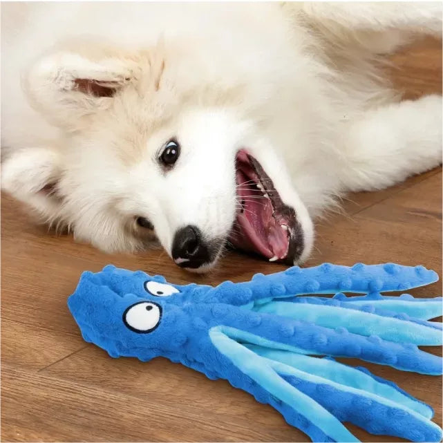 Red no stuffing octopus squeaky dog toy, plush and durable for pet playtime.