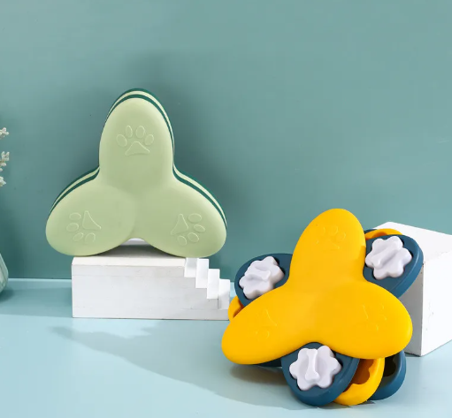 Green interactive dog feeder toy for pets, promoting slow eating and mental enrichment.