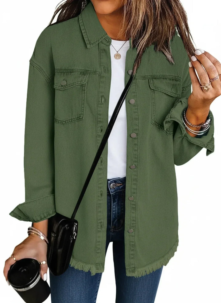 Relaxed fit women's oversized shirt jacket with fringe hem. Stylish outerwear for versatile layering.