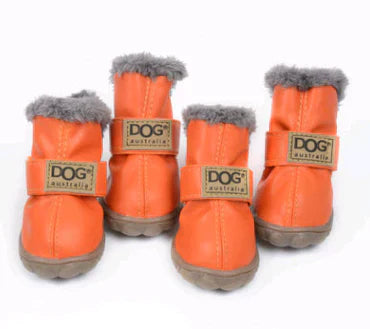 Packaging of unisex dog snow boots, emphasizing waterproof and paw protection