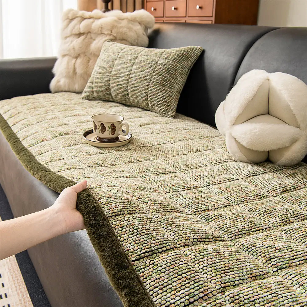 Detail of the frayed edges on a stylish non-slip chenille sofa protector for pet owners