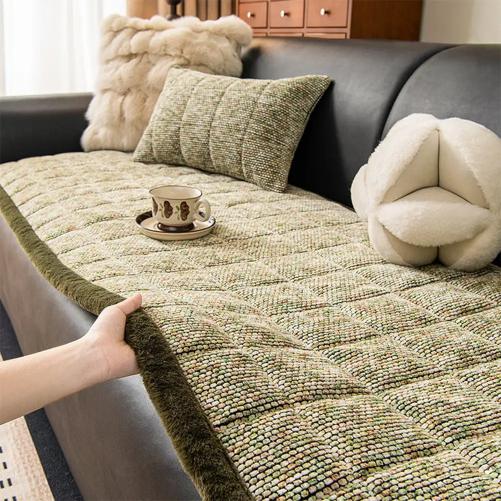 Detail of the frayed edges on a stylish non-slip chenille sofa protector for pet owners