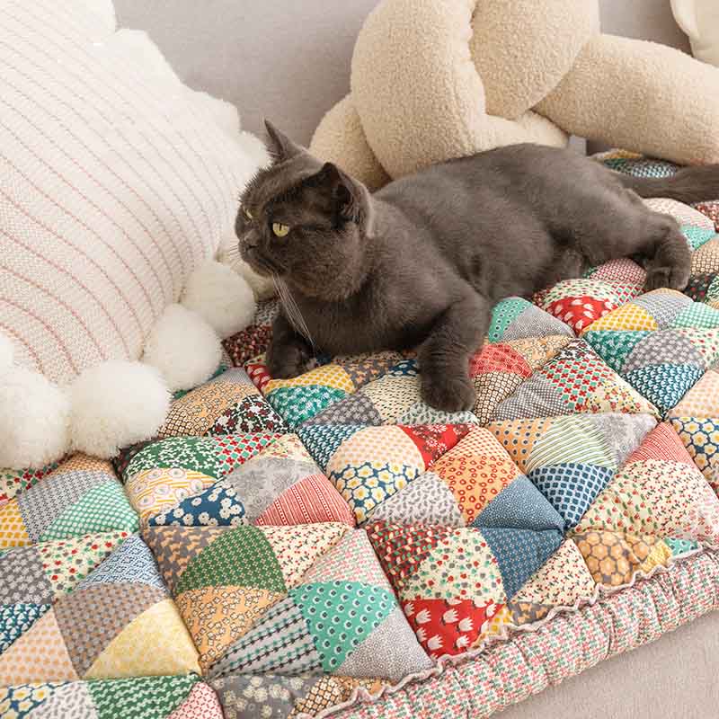 Pet-friendly cotton sofa protector in various sizes, non-slip, offering complete furniture protection