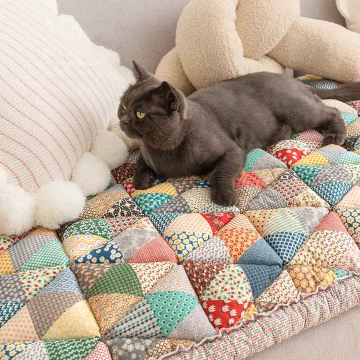 Pet-friendly cotton sofa protector in various sizes, non-slip, offering complete furniture protection