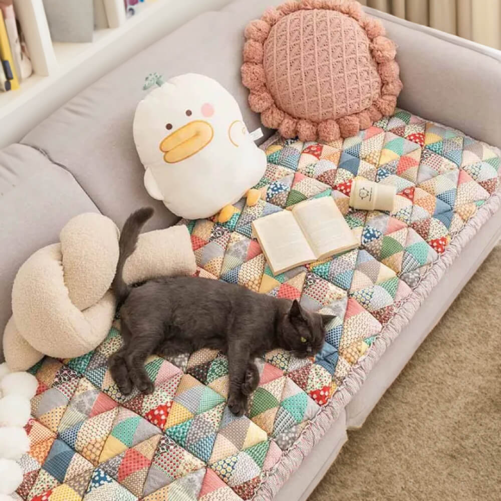 Pet-friendly cotton sofa protector with elegant quilted pattern, non-slip, for modern homes