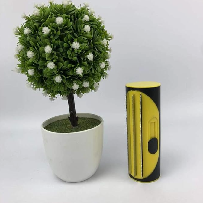 Efficient pet fur and lint remover with self-cleaning function for pet owners.