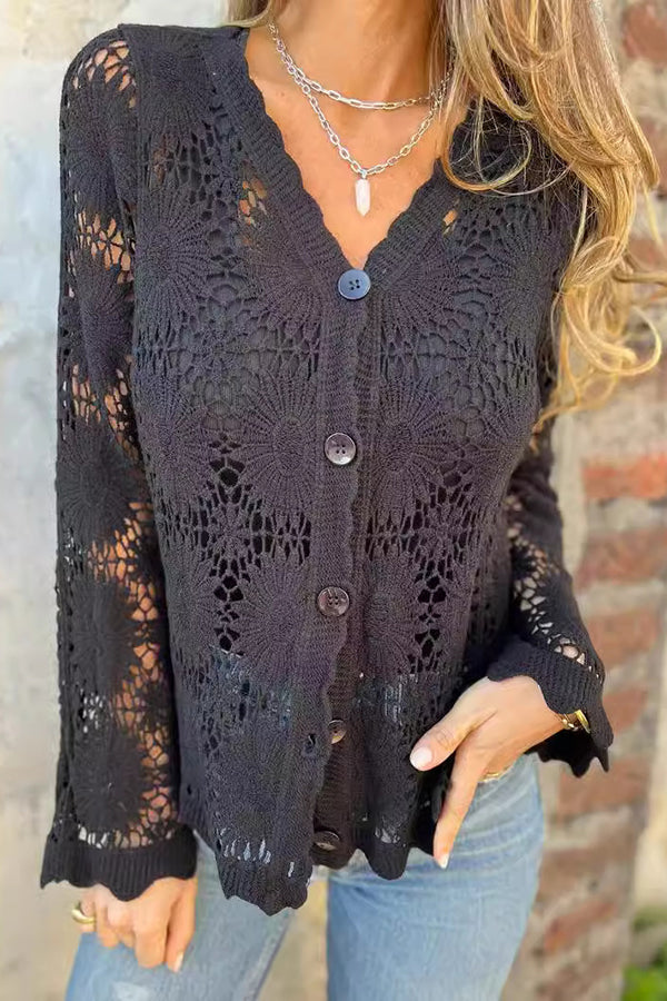 Elegant long-sleeve women's crochet cardigan featuring a button front and delicate scalloped trim. Versatile layering.