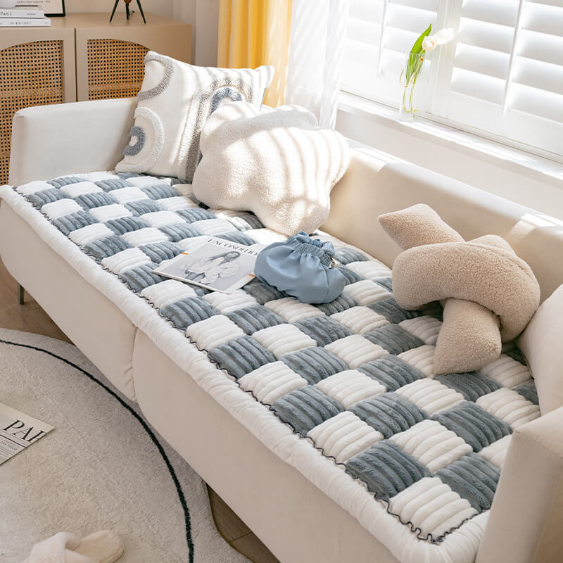 Soft, yet sturdy, chenille sofa cover protecting against spills and pet wear.