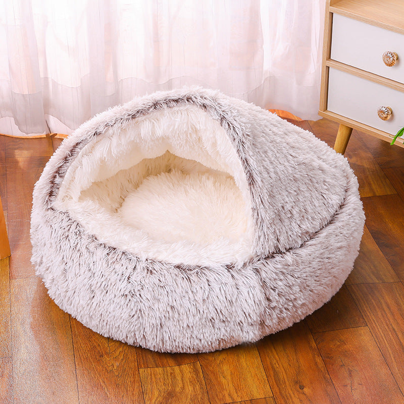 Washable cat bed shown with a care tag, emphasizing its durable and cleanable features