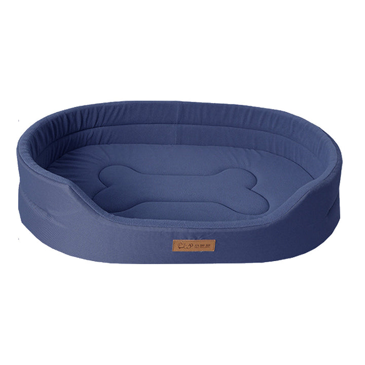 Happy dog relaxing on a plush waterproof pet bed. Easy clean, comfy design.