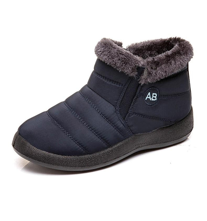 Women's cozy winter ankle boots, durable for all-day comfort in cold weather.