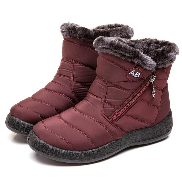 Women's stylish ankle boots, cozy and durable for cold weather comfort.