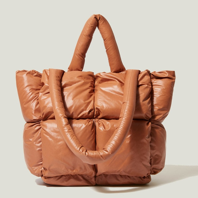 Versatile women's luxury nylon handbag, functioning as a shoulder or crossbody bag. Everyday chic.