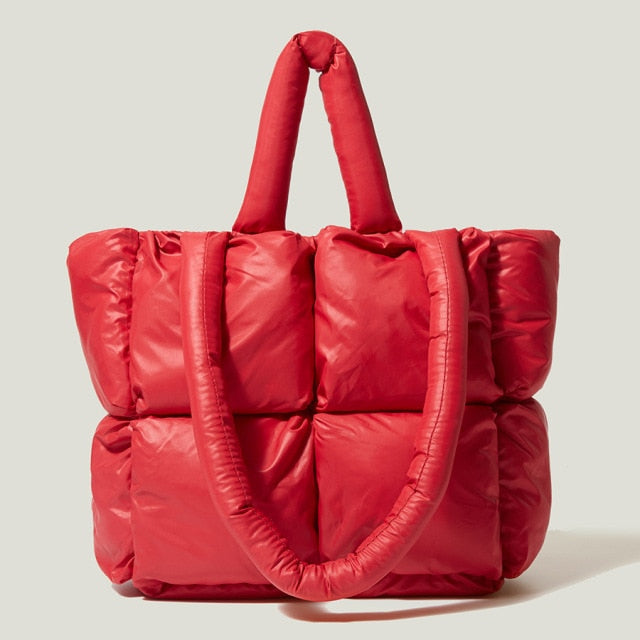 Sleek women's nylon shoulder handbag, a luxury accessory designed for versatile everyday use.