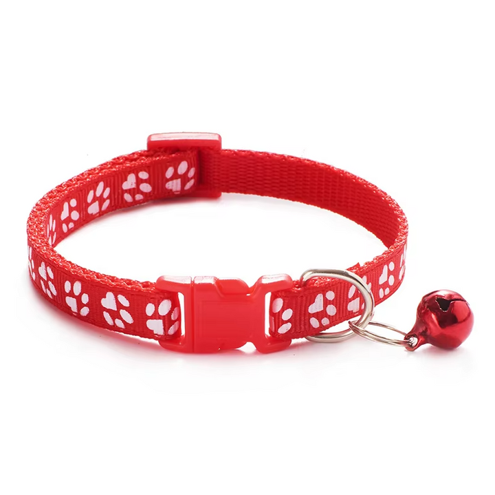 Stylish pink cat collar with a clear bell, featuring an adjustable quick release