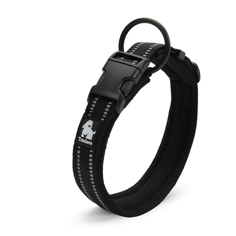 Adjustable pet safety collar in bright color, featuring reflective elements for visibility.