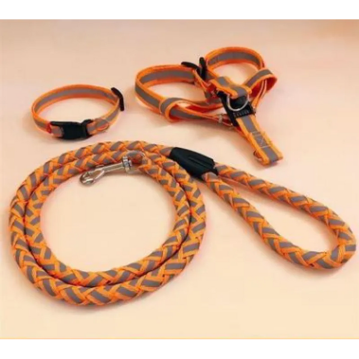 Ergonomic reflective dog harness and matching leash, designed for pet comfort and secure outdoor dog activities.