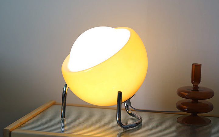 Living room retro glass table lamp with Nordic design, provides soft atmospheric lighting.