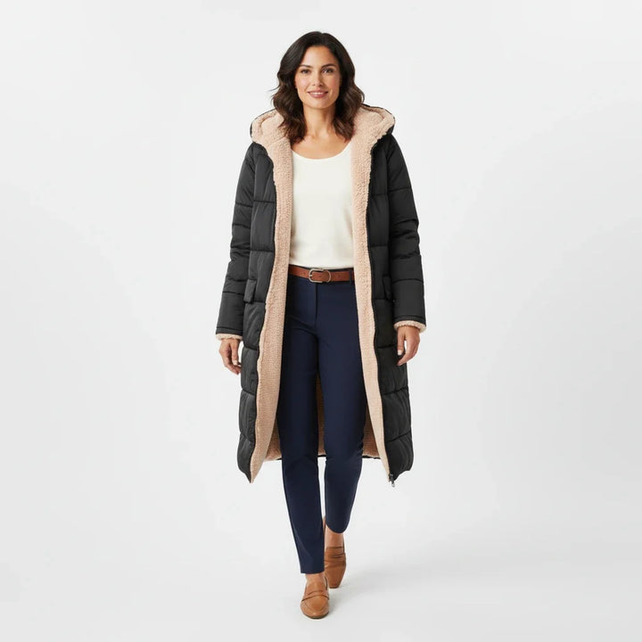 Women's hooded puffer coat, oversized and cozy for ultimate winter comfort.