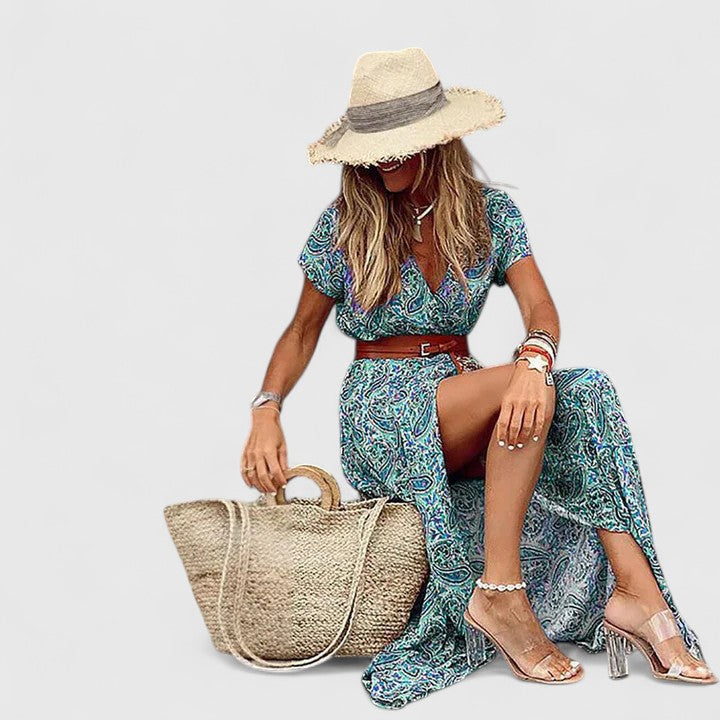 Women's long boho print dress with a gathered waist, an elegant patterned dress for fall and winter comfort.