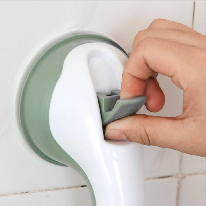 Secure suction shower handle for bathroom safety. Provides stable grab bar support for elderly & handicap mobility.