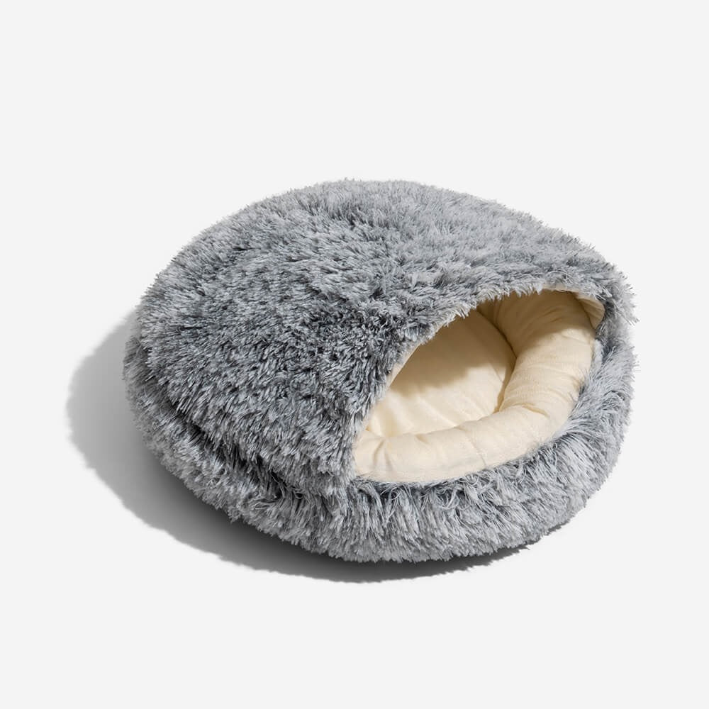 New semi-enclosed pet nest bed, plush fabric, calming design for comfortable sleep.