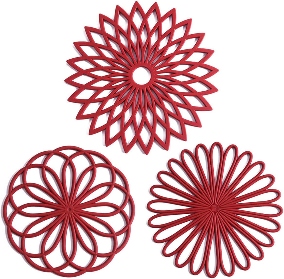 Modern set of 3 silicone coasters, heat-resistant pot pads for kitchen and dining.