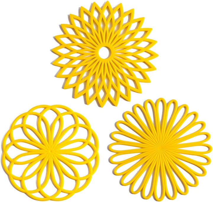 Non-slip silicone pot pads, a set of 3, ideal for kitchen countertops & dining tables.