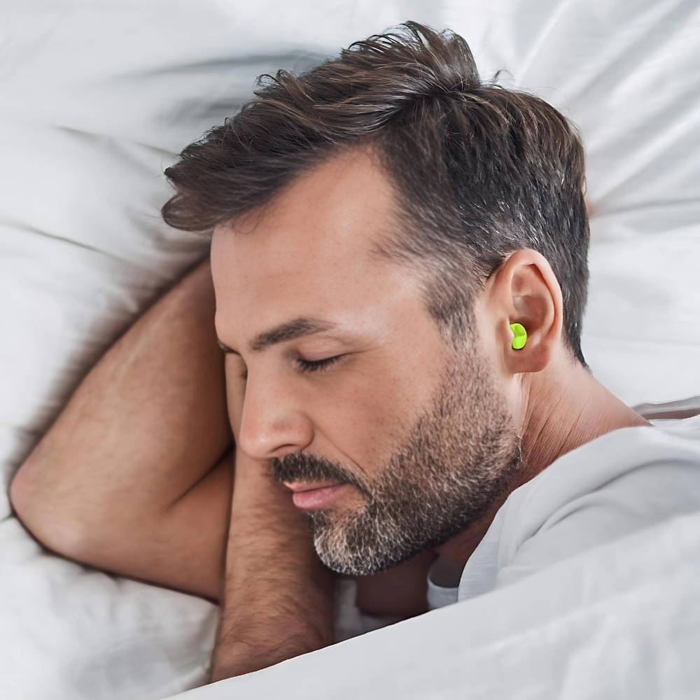 Bright yellow SilentComfort noise-cancelling earplugs. Waterproof, reusable for sleep, swimming, & hearing protection.