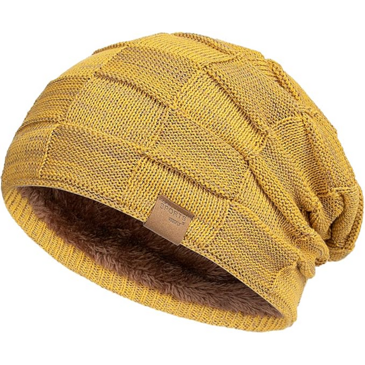 Unisex slouchy knitted beanie hat in classic black for warm winter comfort & casual style.