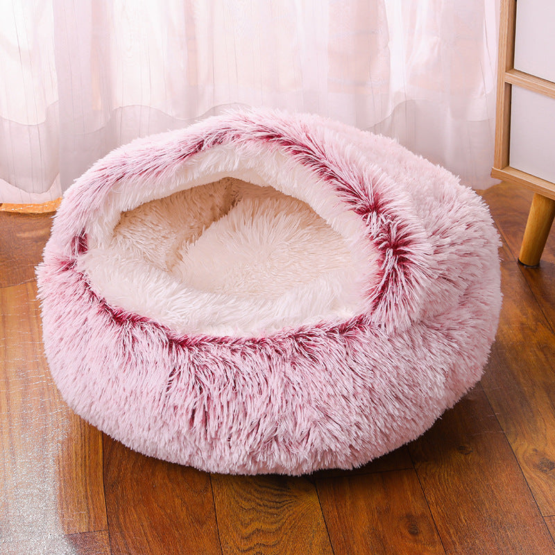 Elegant gray faux fur pet bed, a self-warming half-cave design for small dogs needing anxiety relief and coziness.