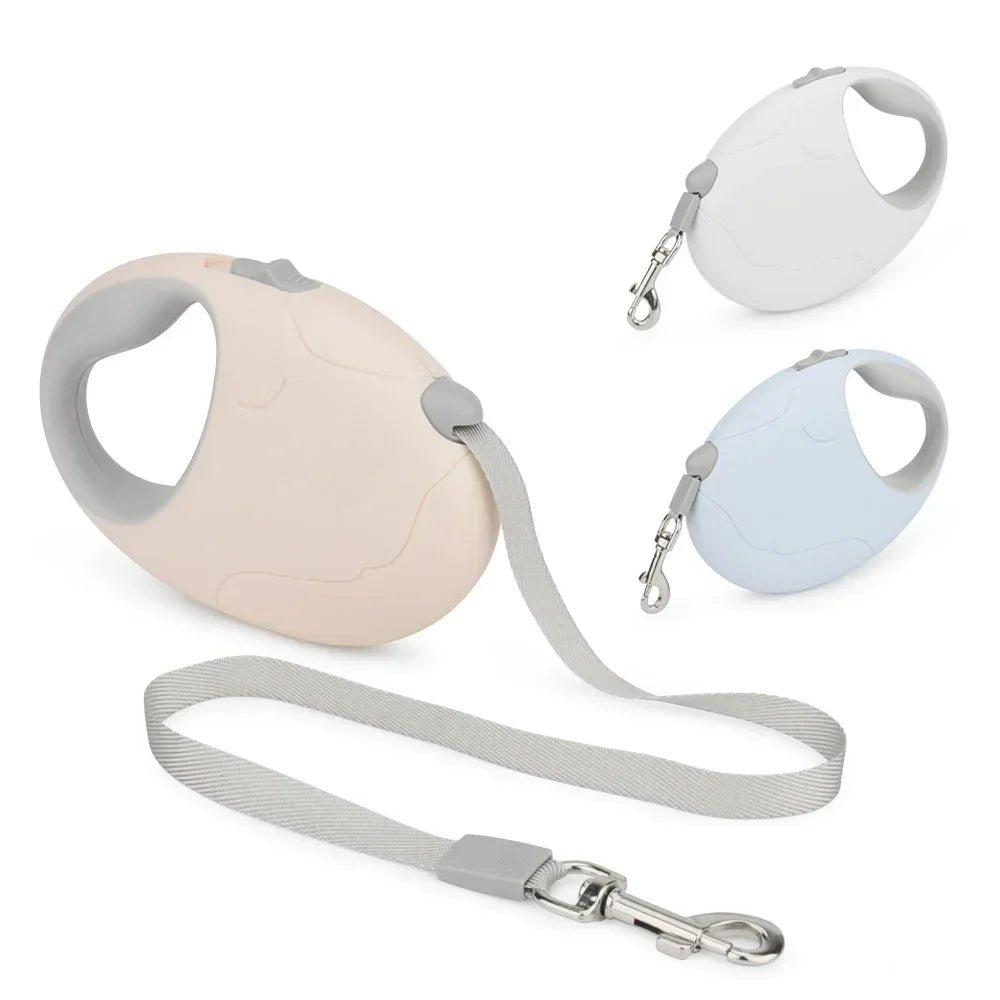 Outdoor pet walking gear: retractable nylon leash for small dogs, featuring an ergonomic black handle