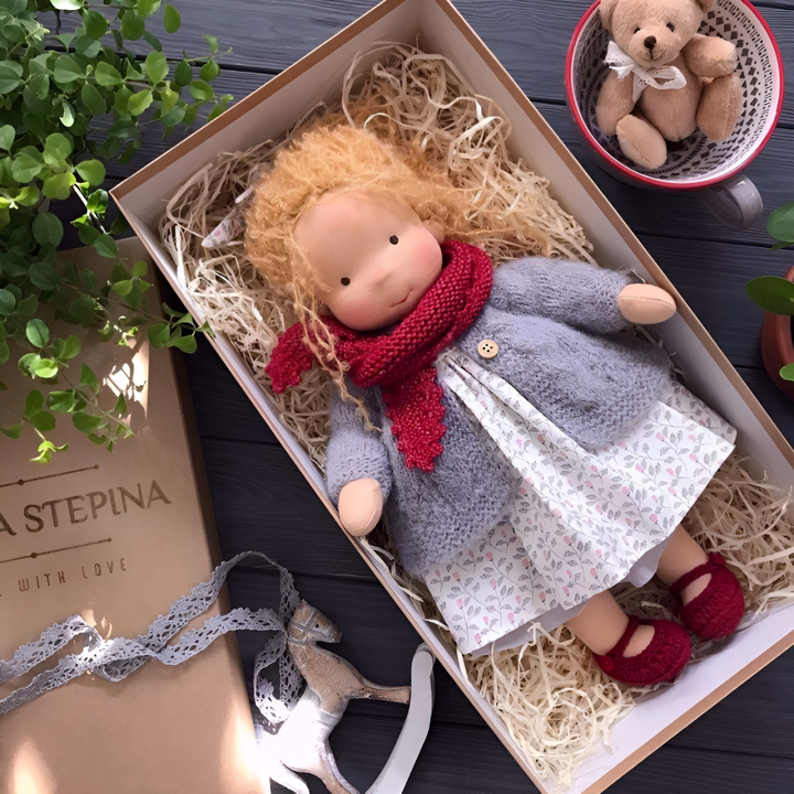 Cuddly soft Waldorf doll, an imaginative play toy for kids, made from organic cotton.