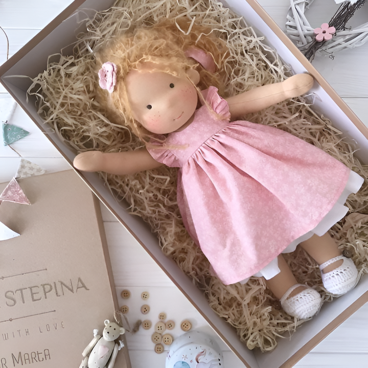 Traditional handcrafted Waldorf doll, a wool comfort toy for children's imaginative play.