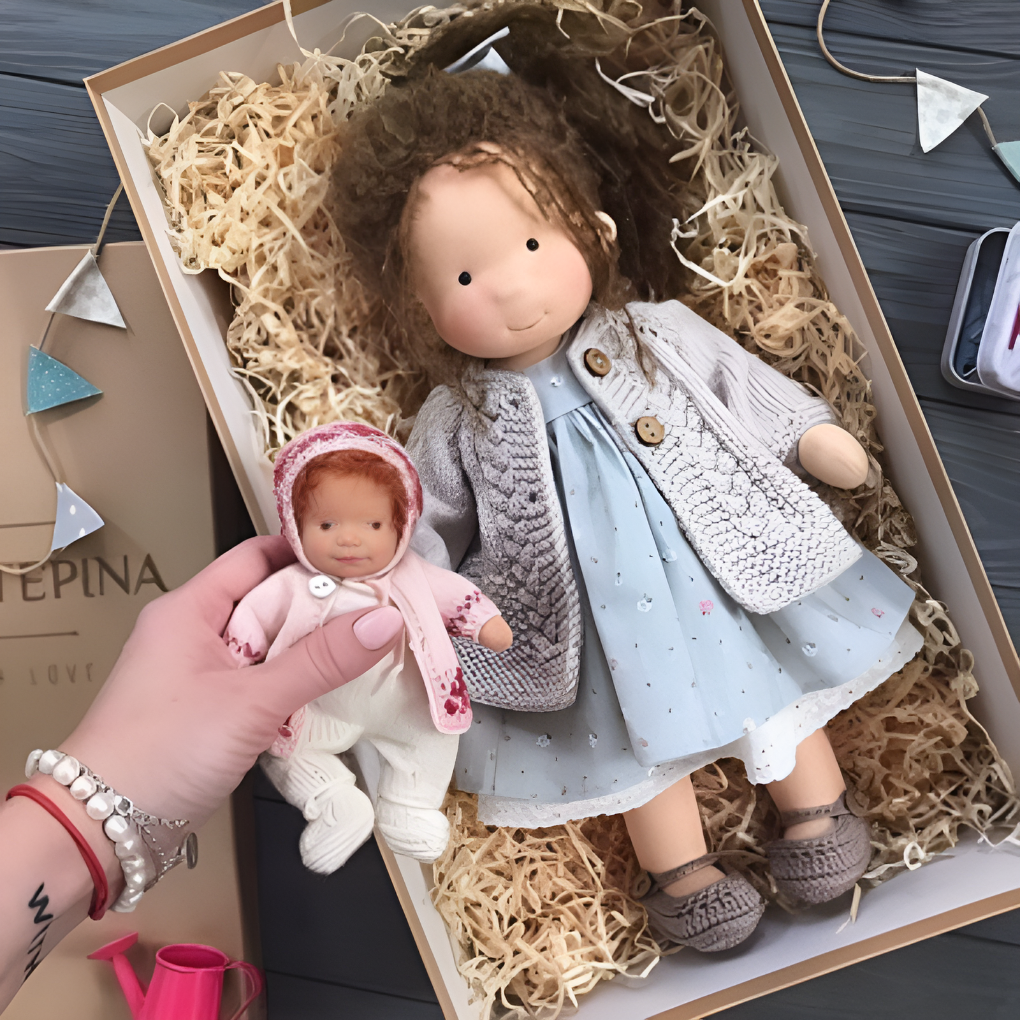 Handmade Waldorf baby doll, stuffed with wool, a gentle comfort toy for infants.