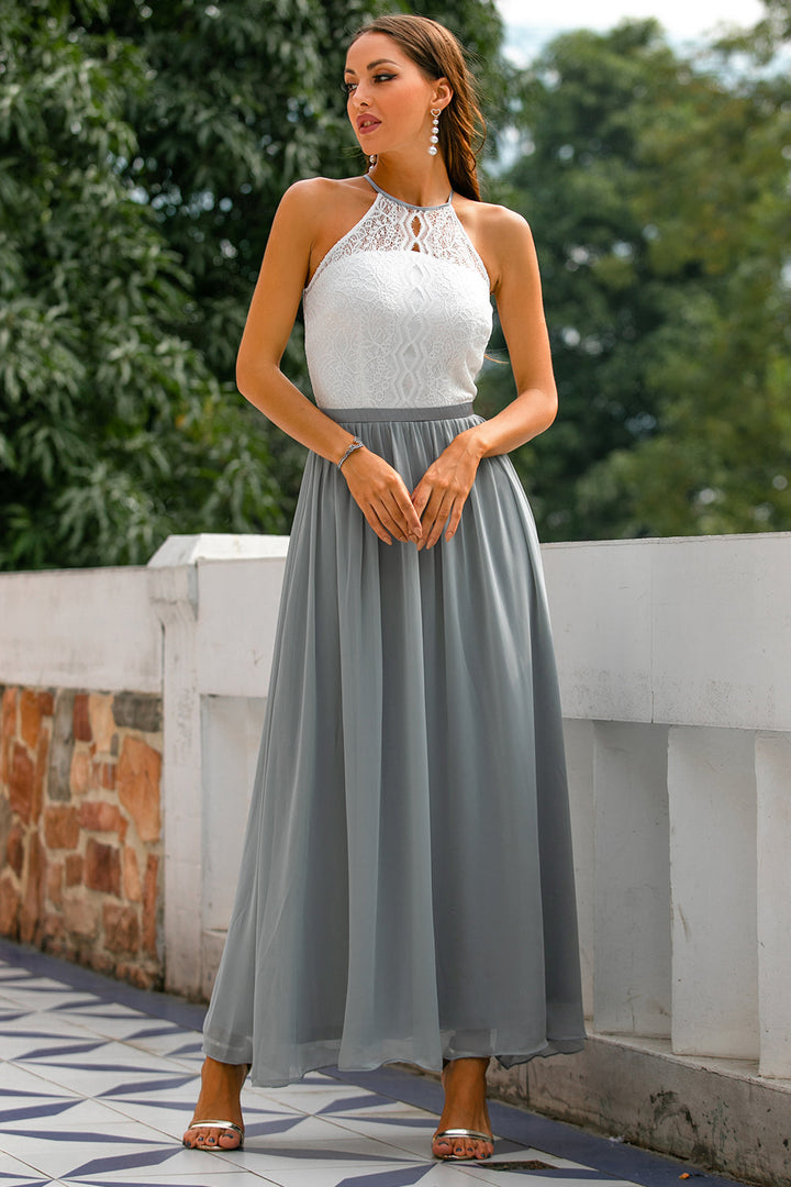 Front view of an elegant halter neck maxi dress, ideal for women attending a wedding or formal event.