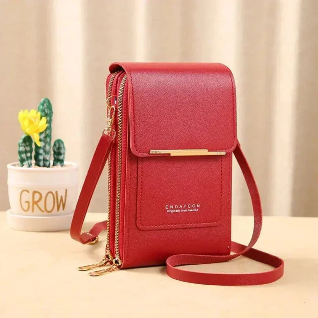 Fashionable women's crossbody phone bag. Small, secure, & stylish for convenient daily use as a shoulder bag.