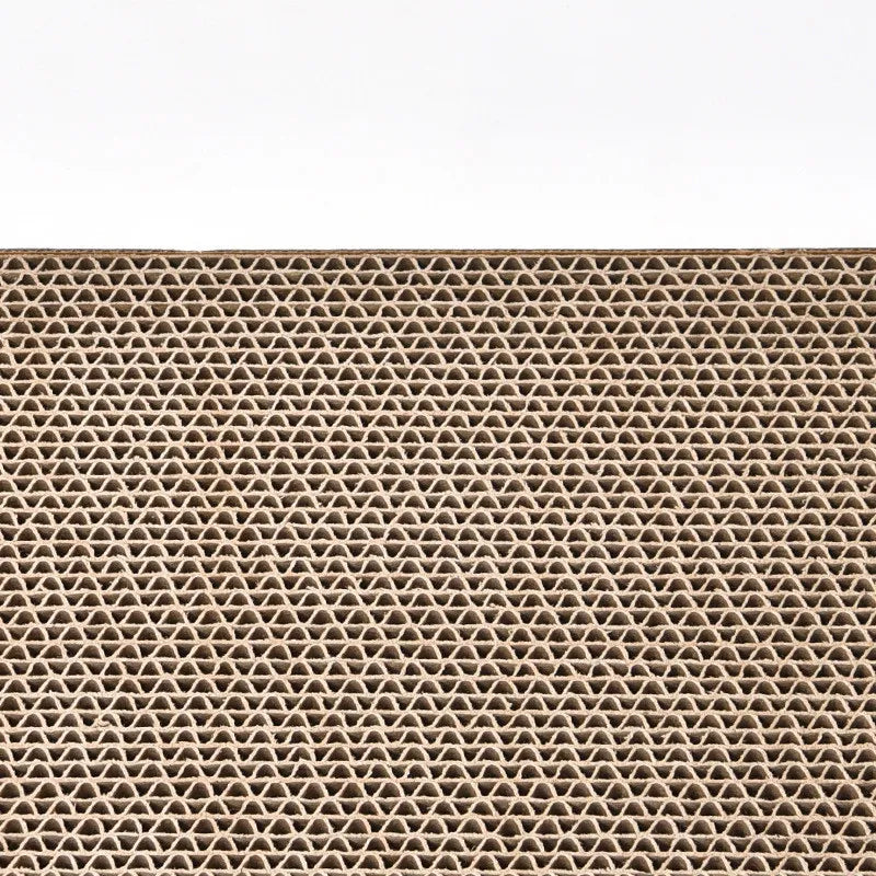 Cat scratch mat with attached plush fish toy, protects furniture, provides feline entertainment