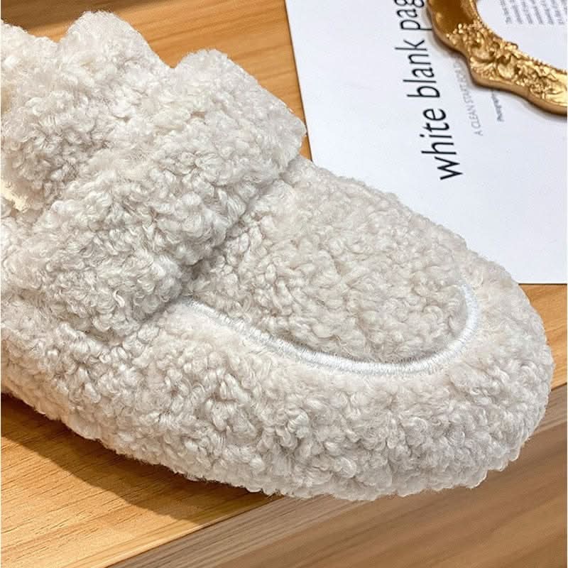Plush, cozy winter house shoes. Unisex design with non-slip sole provides ultimate warmth & indoor comfort.