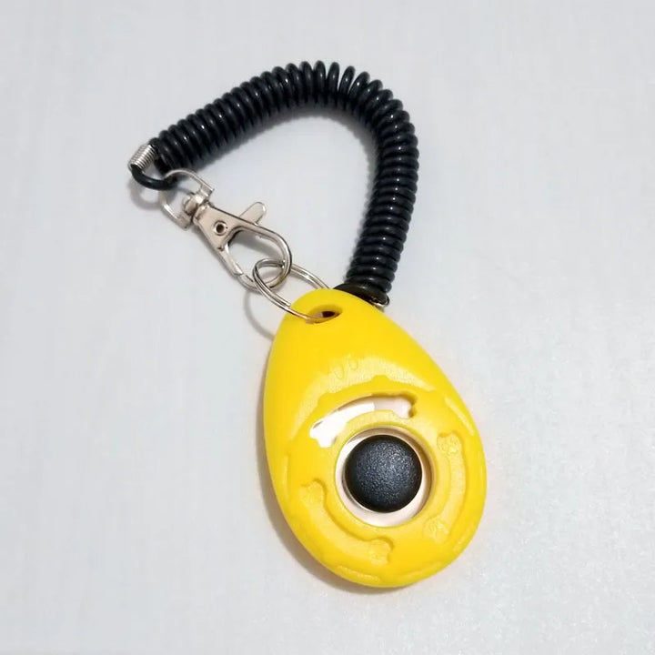 Dog obedience training clicker with convenient wrist spiral and snap attachment