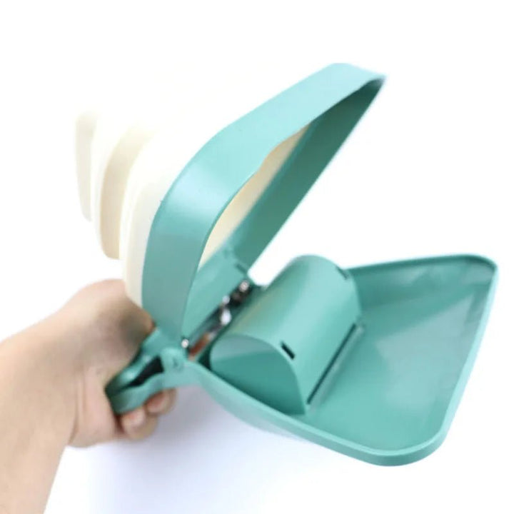 Compact eco-friendly dog poop scooper with integrated biodegradable bag dispenser, pet cleanup