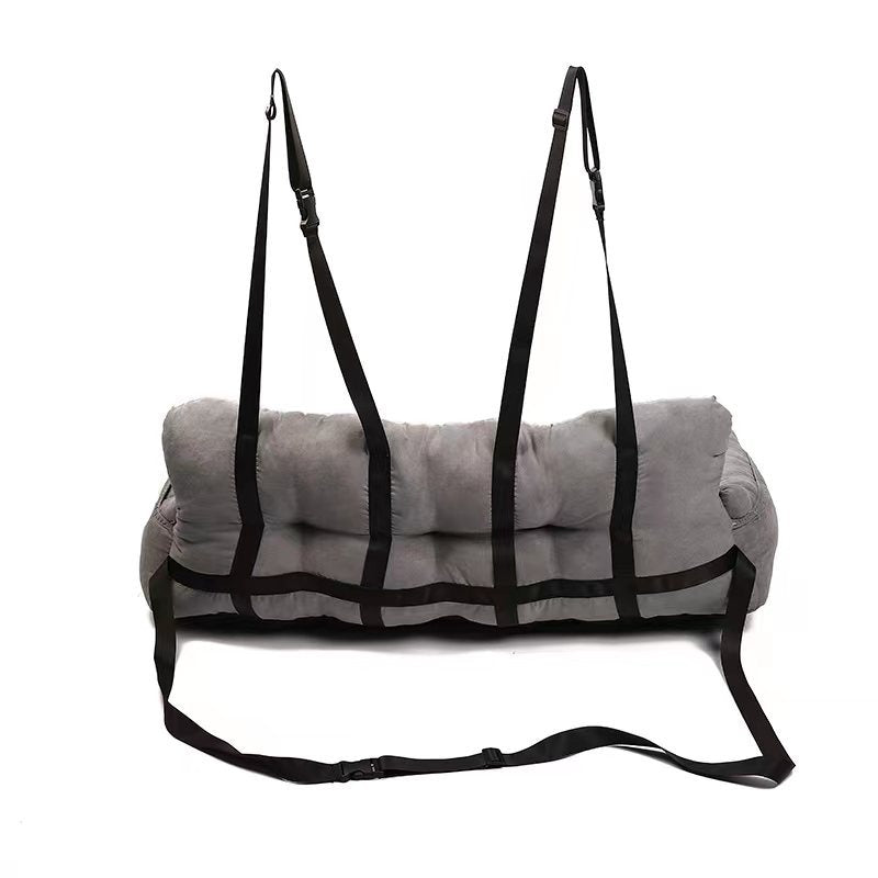 Pet travel booster seat for car console, beige, with adjustable straps, washable pet bed for vehicle.